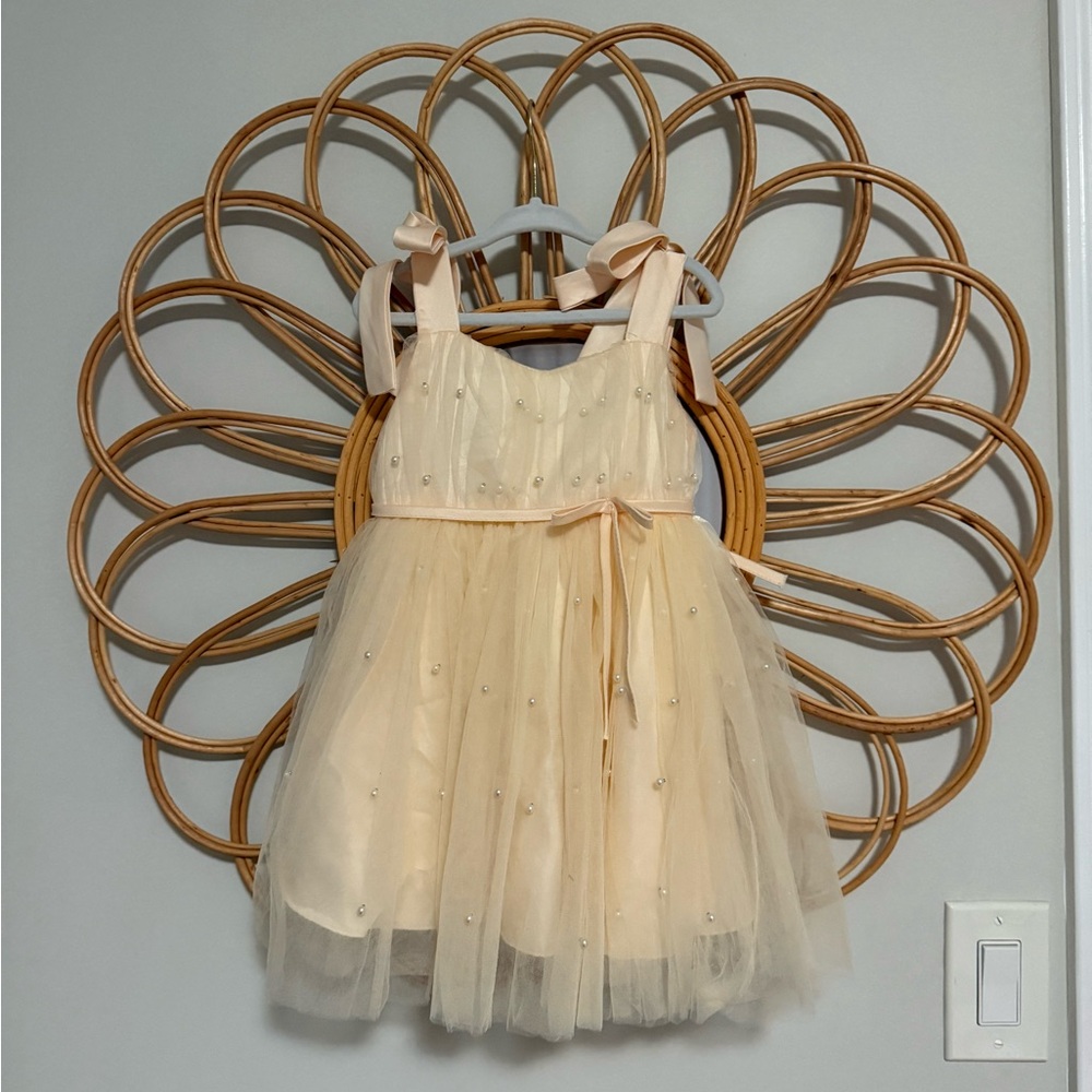 Elegant Cream Tulle Dress with Bow